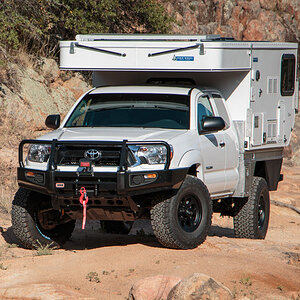 four_wheel_fleet_flatbed_toyota_tacoma_overland_vehicle_popup_camper_xp.jpg