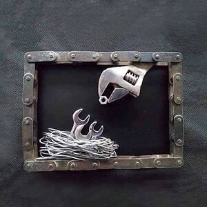 Rare photo of a Mother Wrench feeding her Young.jpg