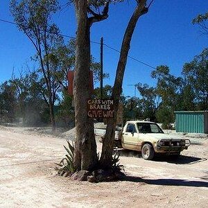 When travelling in the Outback, it pays to keep an eye out for signs, even odd ones stuck in tre.jpg