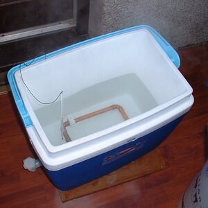 watercheckedfortemperatureinmashtun.jpg