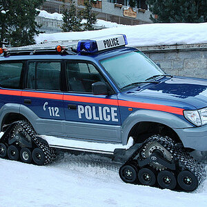 toyota-landcruiser-on-caterpillar-tracks-maurice-koop603-l_zpsea8ba0b1.jpg