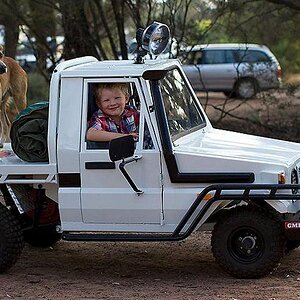 883422-boy-with-mini-land-cruiser.jpg