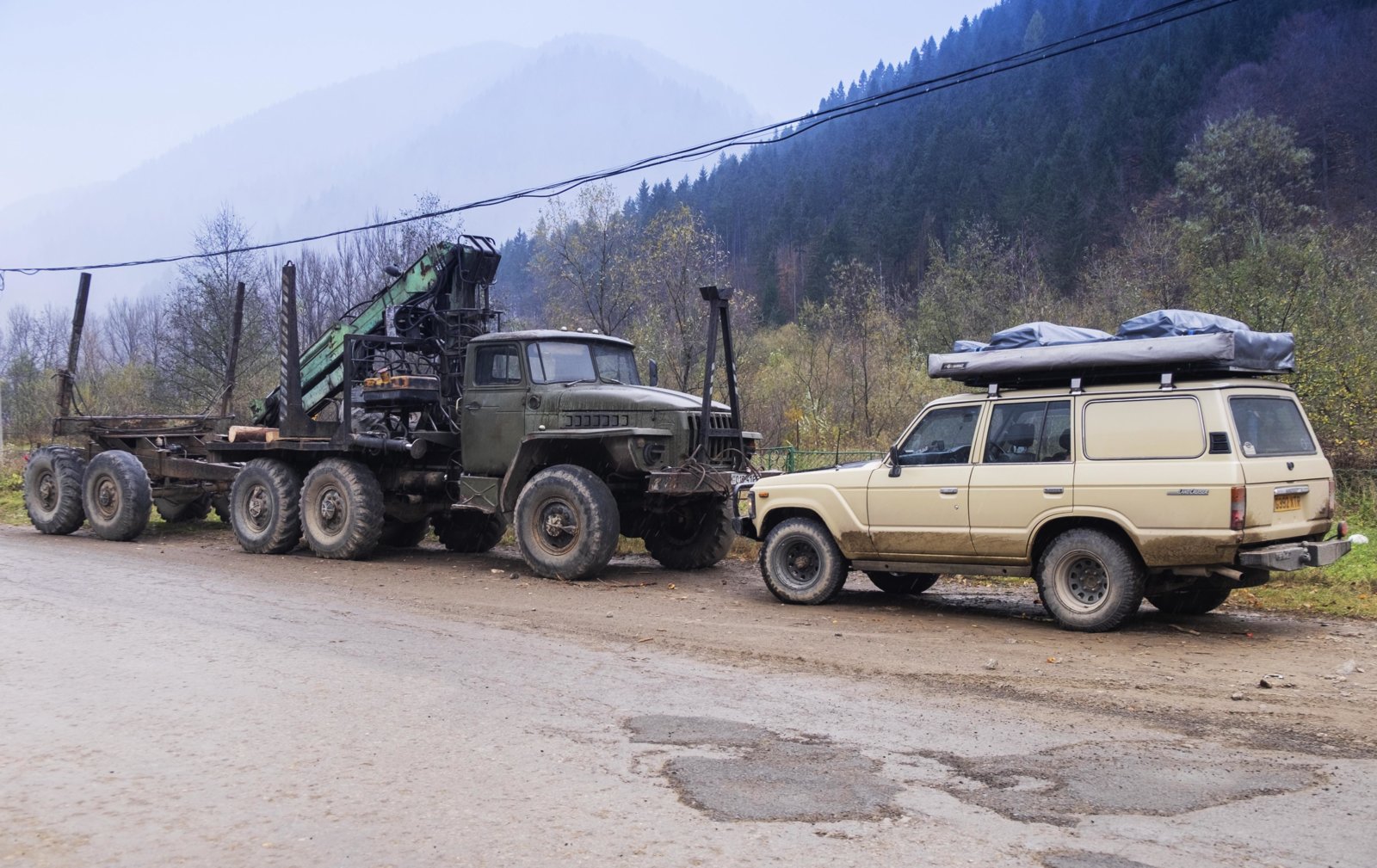 cruiser and logging truck smaller.jpg
