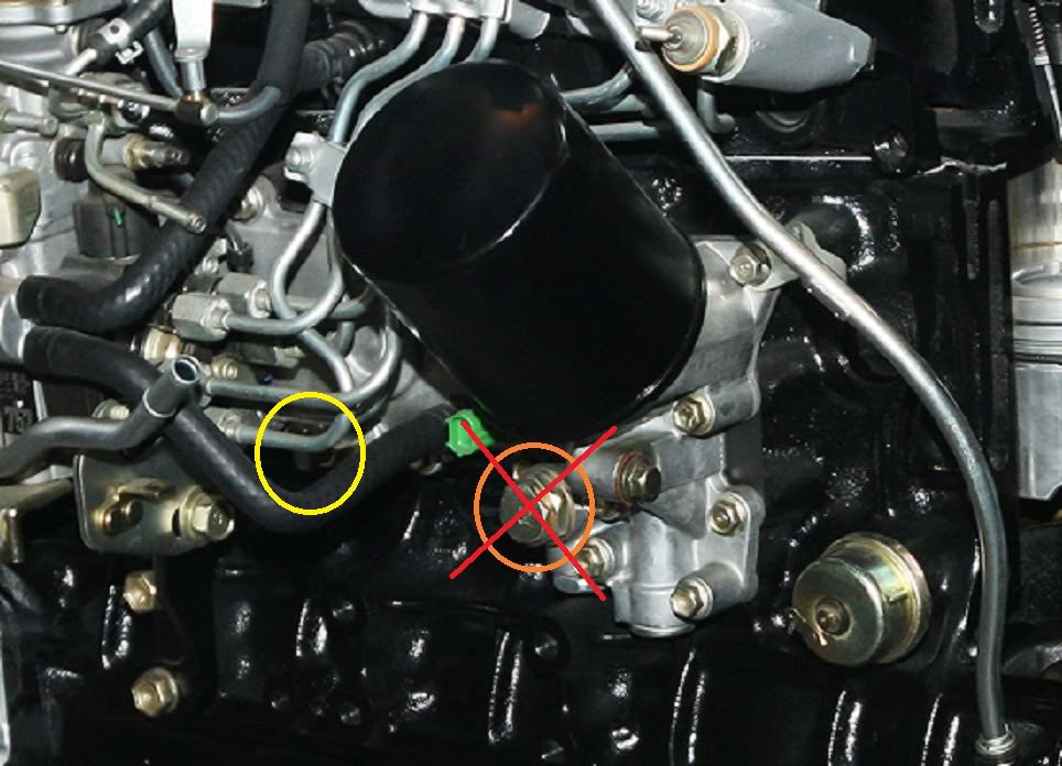 LC801HD-TEngineBlockCoolantStopCockDrainPlugCircled2.jpg