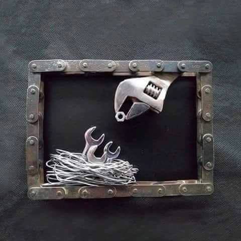 Rare photo of a Mother Wrench feeding her Young.jpg
