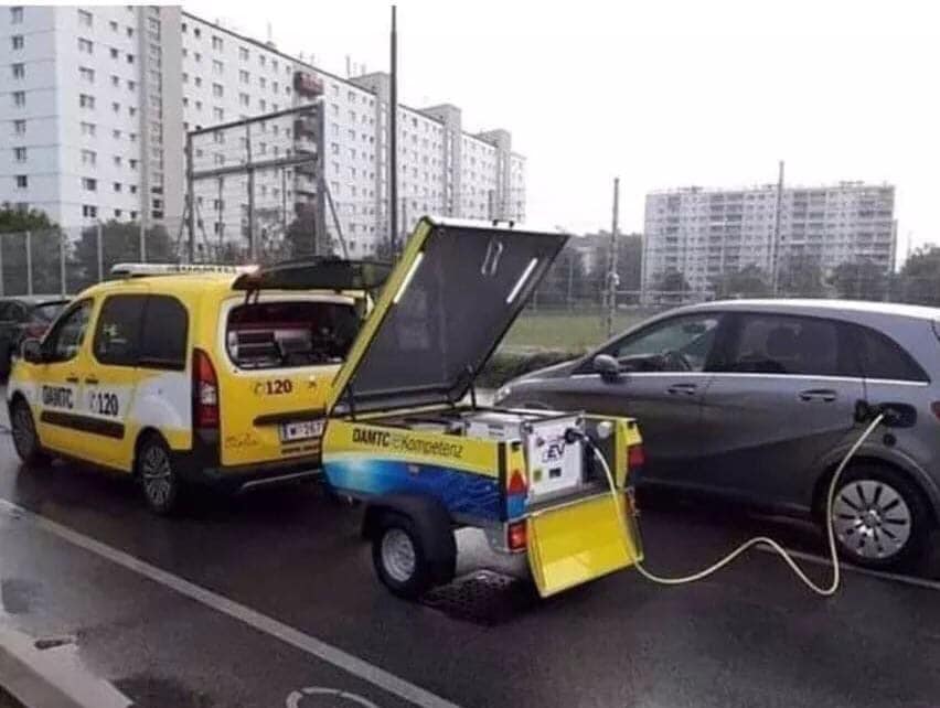 So here we have a diesel van with a petrol generator charging an electric car.jpg