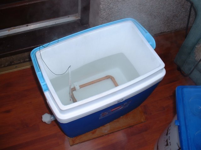 watercheckedfortemperatureinmashtun.jpg