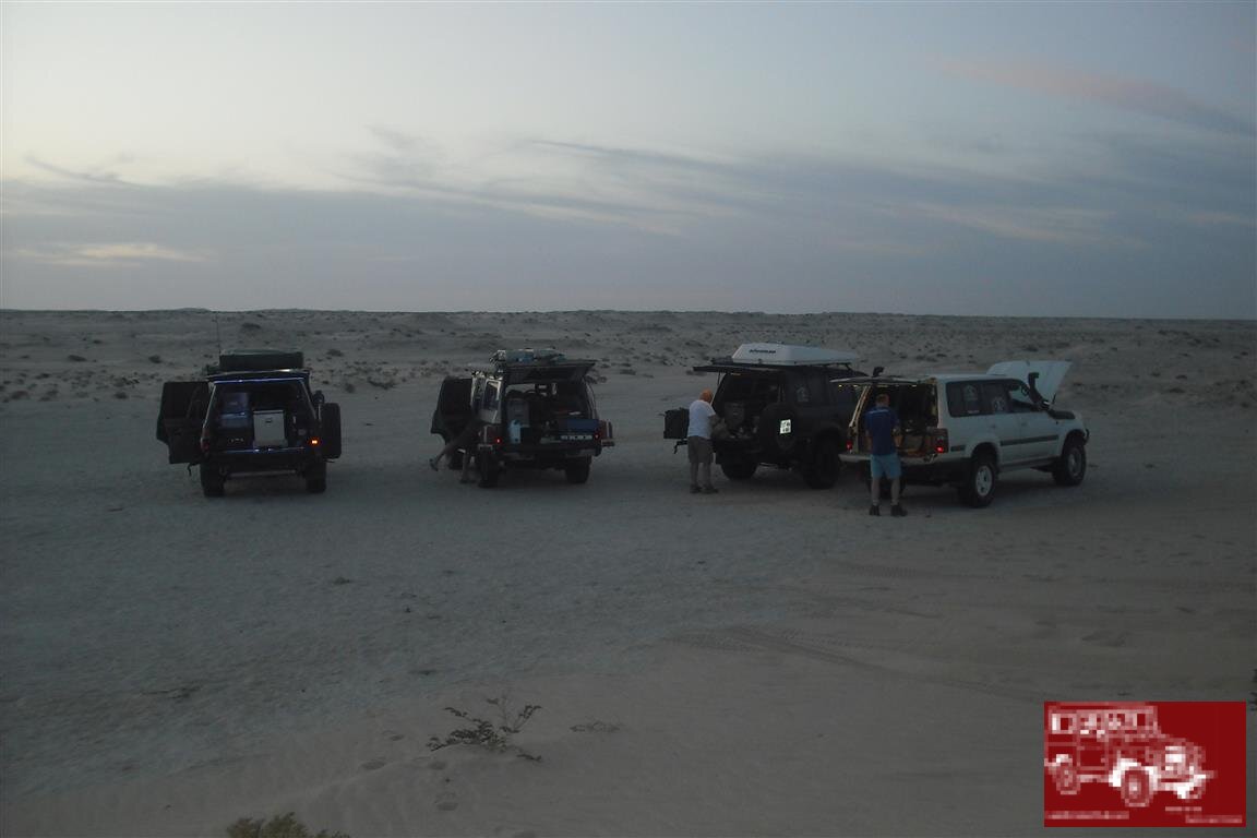 Wild camping on rock beside the dunes